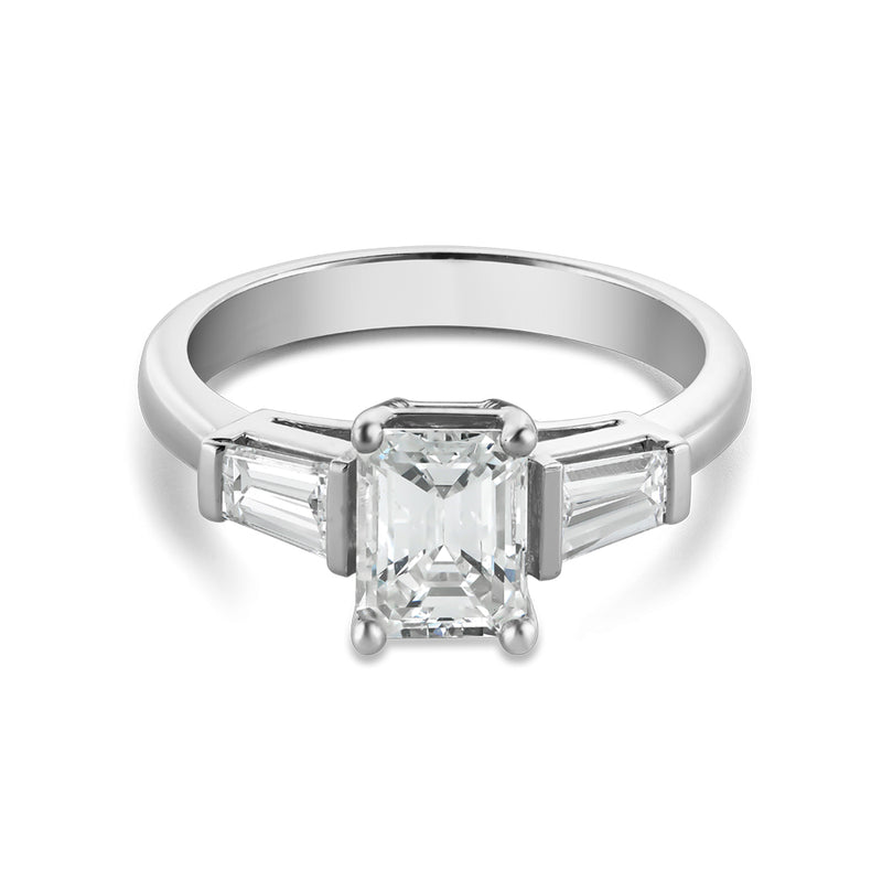 Emerald cut engagement ring with baguettes